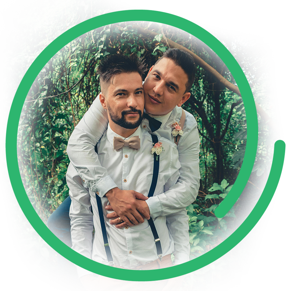 a photo of a happy gay couple embracing